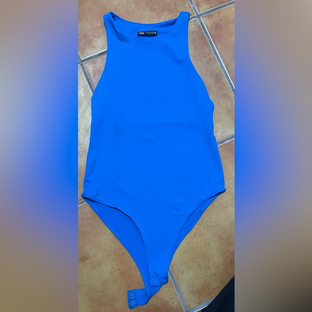 Body suit from Zara. Barely used.
